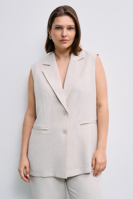 жилет от бренда снежная королева вид слева