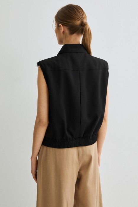 жилет по цене 1860 руб вид справа