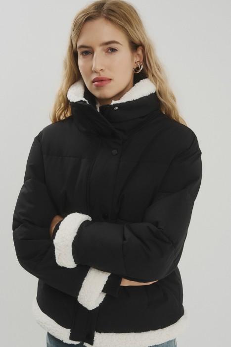 зимняя куртка с меховой отделкой от бренда снежная королева вид слева