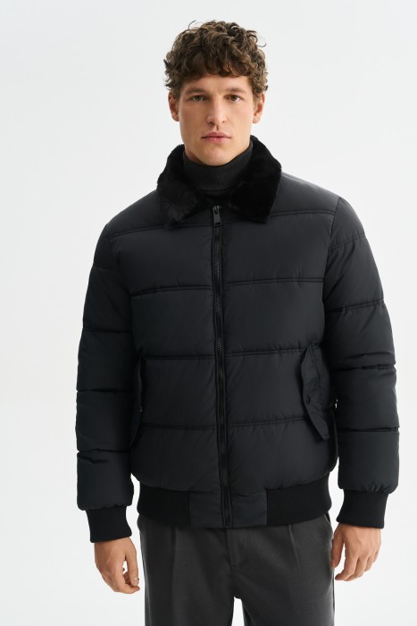 зимняя куртка с меховой отделкой от бренда снежная королева вид слева