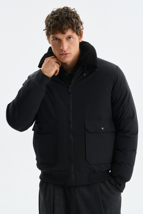 зимняя куртка с меховой отделкой от бренда снежная королева вид слева