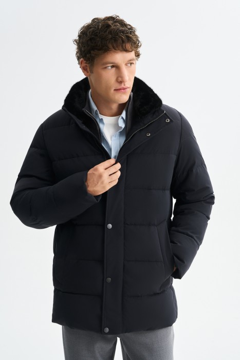 зимняя куртка с меховой отделкой от бренда снежная королева вид слева