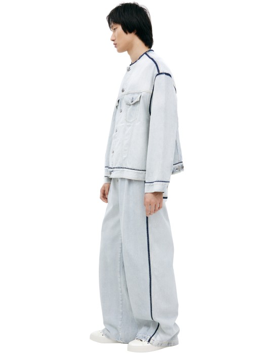 джинсовая куртка с контрастными швами от бренда maison margiela вид слева