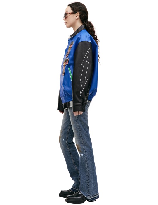 кожаная куртка saint michael х denim tears с нашивками от известного бренда вид слева