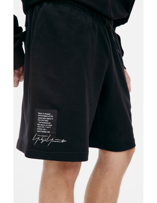 шорты с логотипом yohji yamamoto x new era по цене 44000 руб вид справа