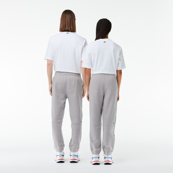 брюки  для спорта унисекс из органического хлопка от бренда lacoste вид слева