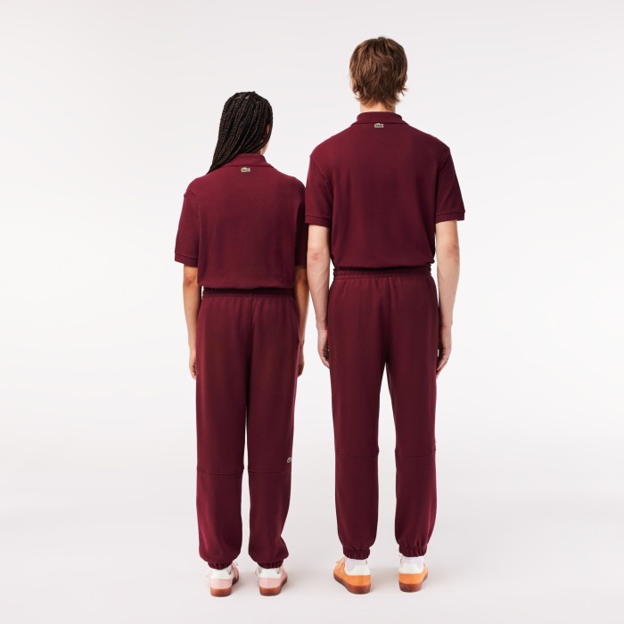 брюки  для спорта унисекс из органического хлопка от бренда lacoste вид слева