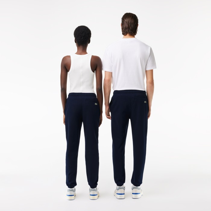 cпортивные брюки  унисекс из хлопка от бренда lacoste вид слева
