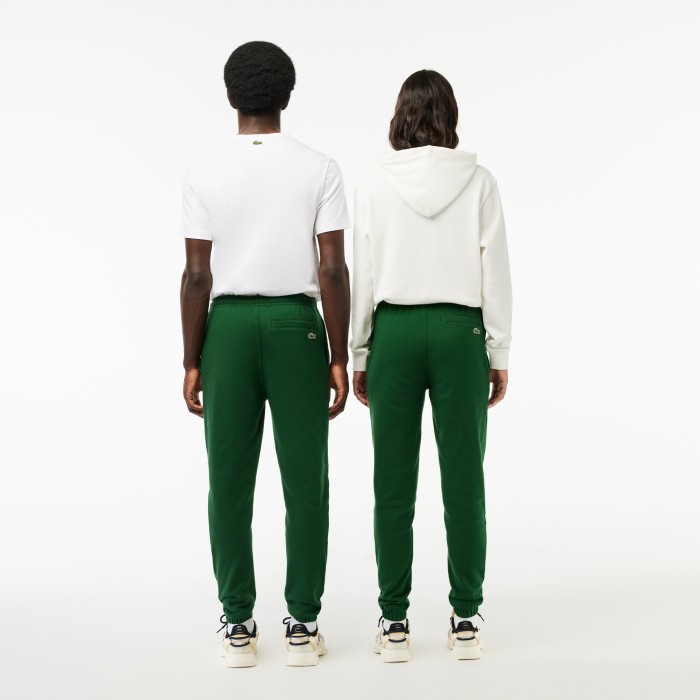 cпортивные брюки  унисекс из хлопка от бренда lacoste вид слева