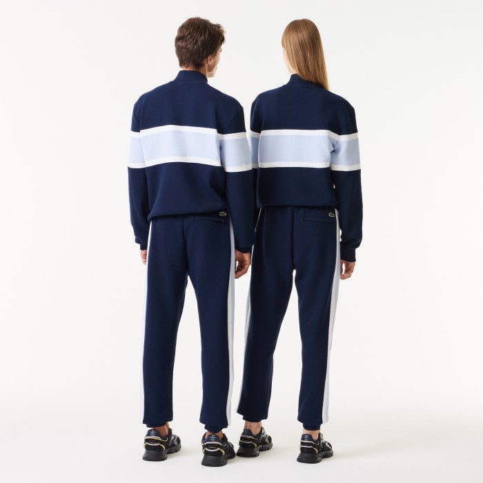 cпортивные брюки  унисекс от бренда lacoste вид слева