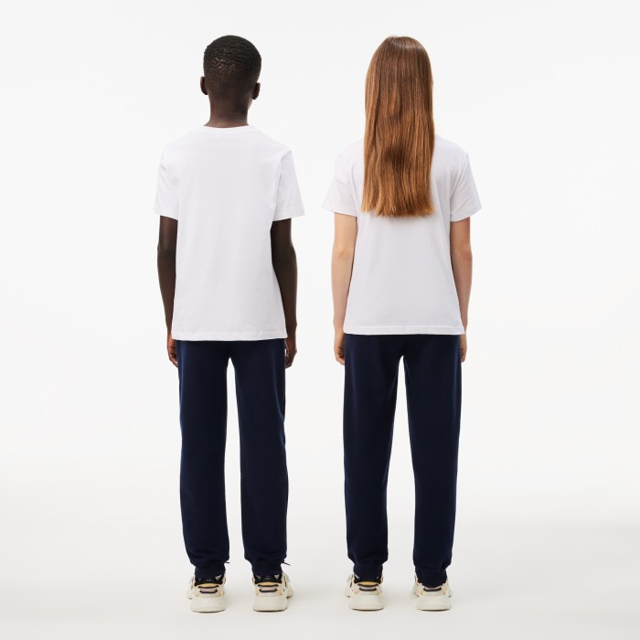 детские флисовые спортивные брюки  от бренда lacoste вид слева