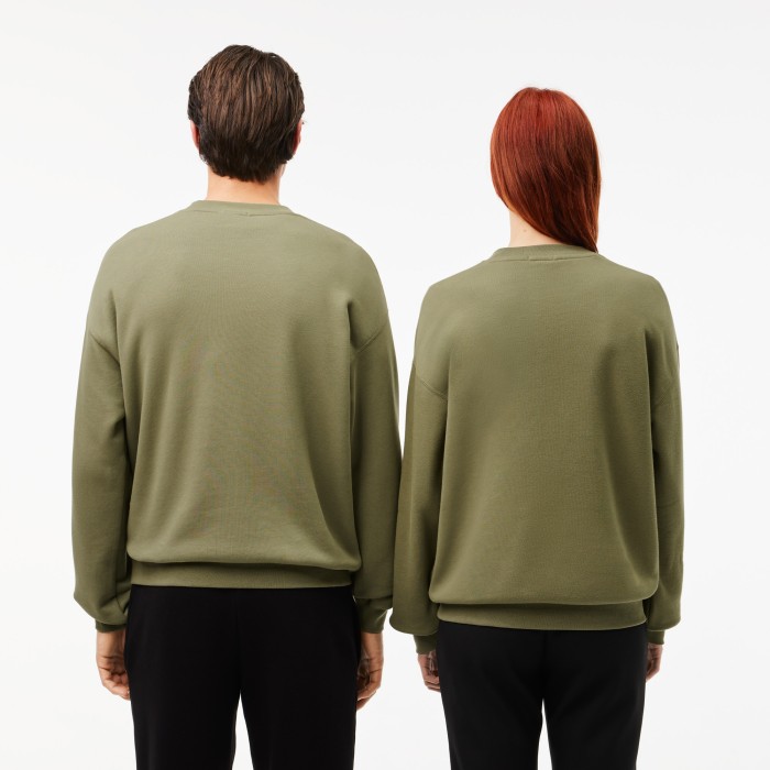 флисовый свитшот  унисекс от бренда lacoste вид слева