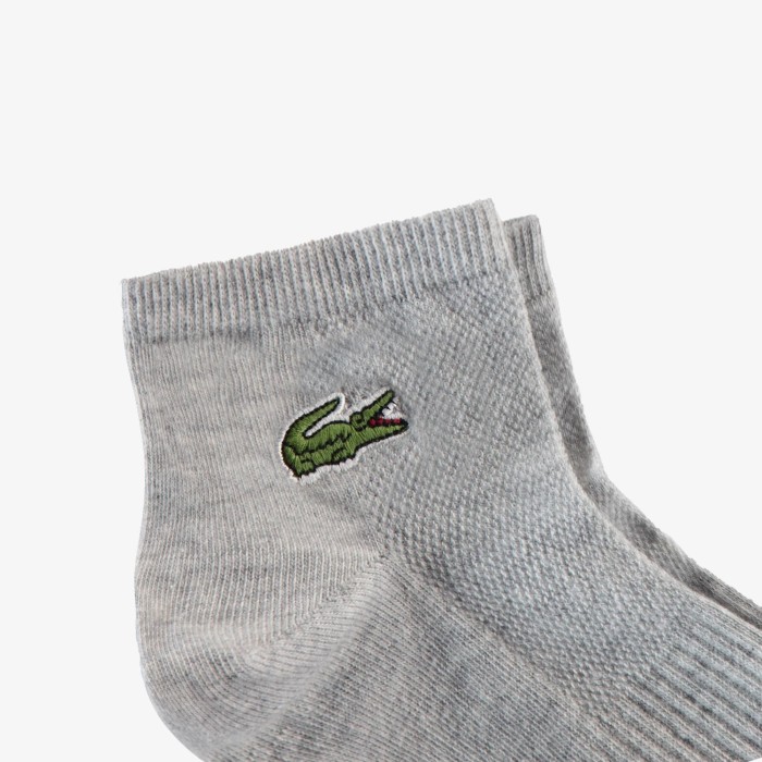 хлопковые носки  от бренда lacoste вид слева