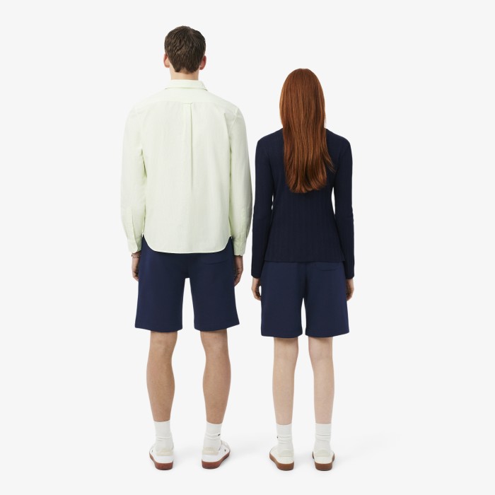 хлопковые шорты  унисекс от бренда lacoste вид слева