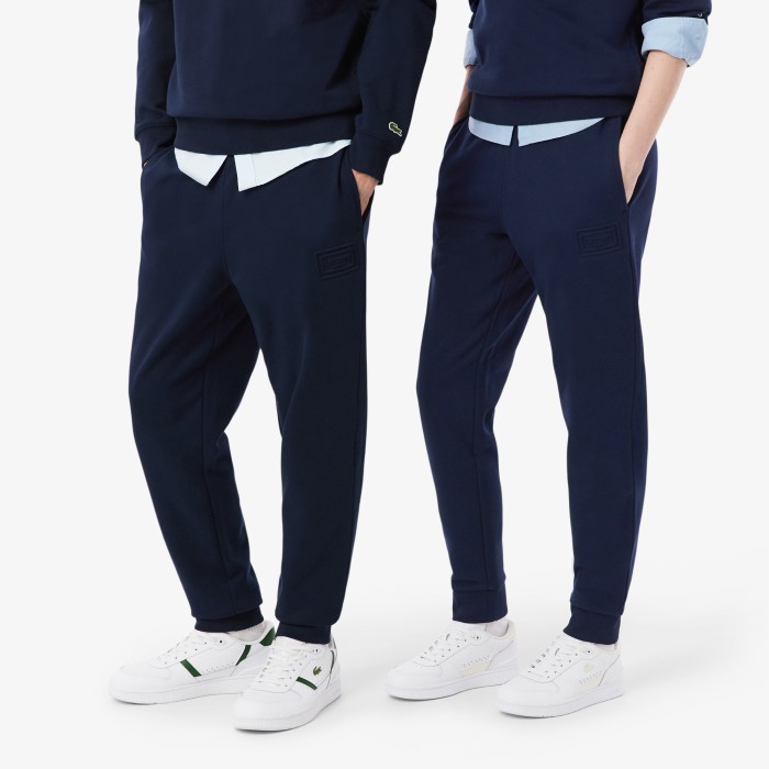 хлопковые спортивные брюки  унисекс от бренда lacoste вид слева
