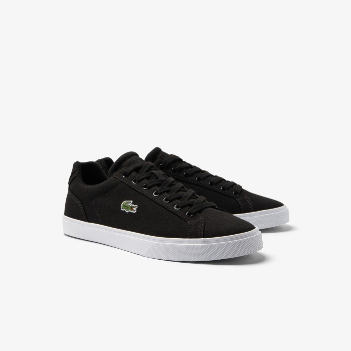 кеды  от бренда lacoste вид слева