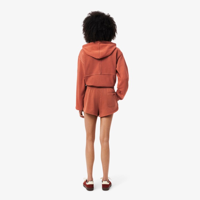 короткие шорты  с эффектом стирки от бренда lacoste вид слева