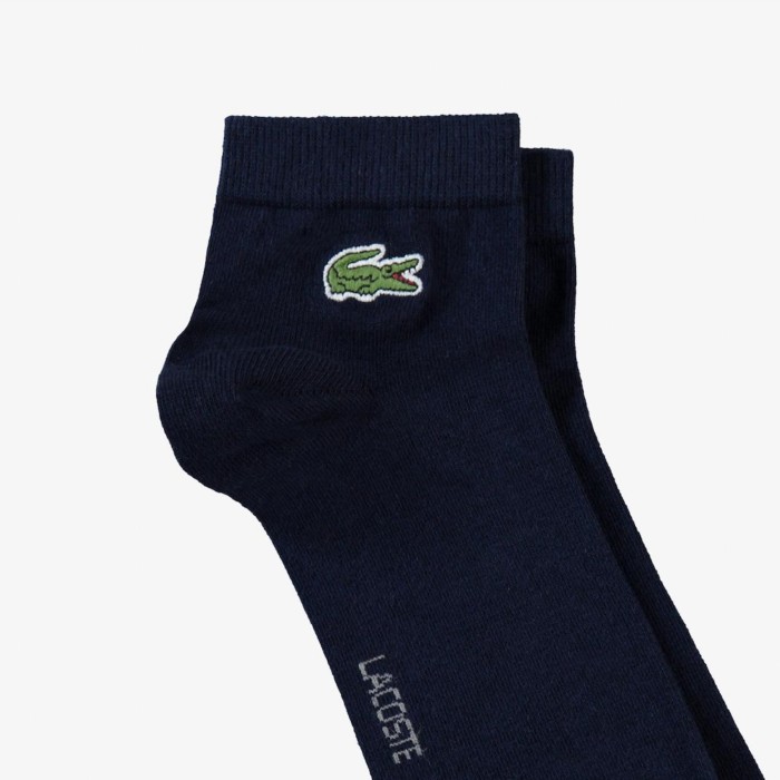 короткие спортивные носки  унисекс от бренда lacoste вид слева