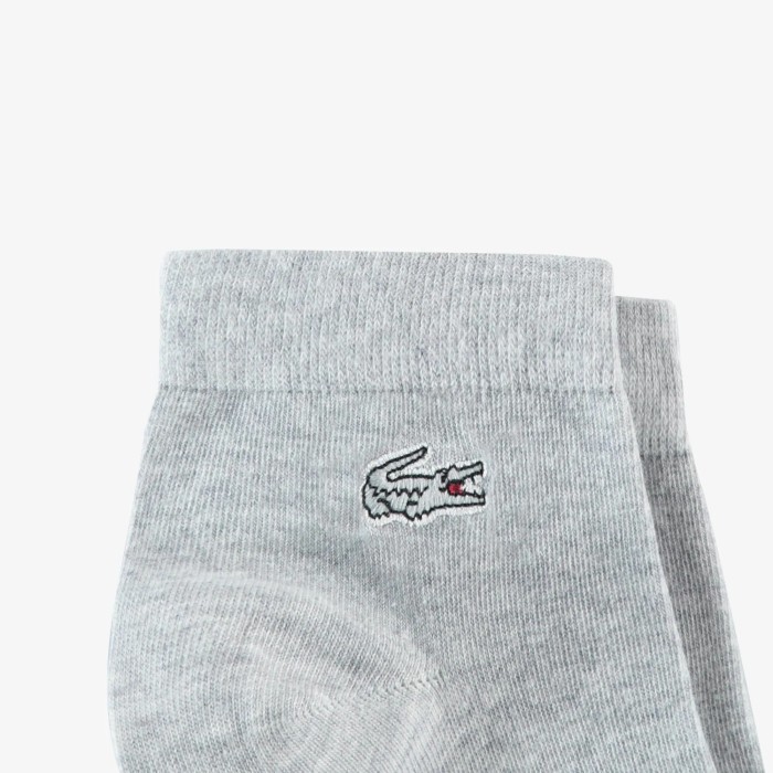 короткие спортивные носки  унисекс от бренда lacoste вид слева