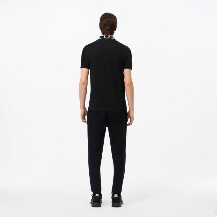мужские брюки  для спорта из меланжевой смеси хлопка от бренда lacoste вид слева
