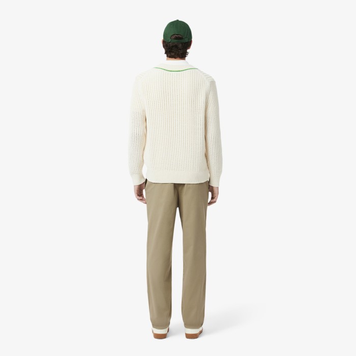 мужские брюки  из эластичного органического хлопка от бренда lacoste вид слева