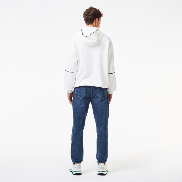 мужские джинсы  от бренда lacoste вид слева