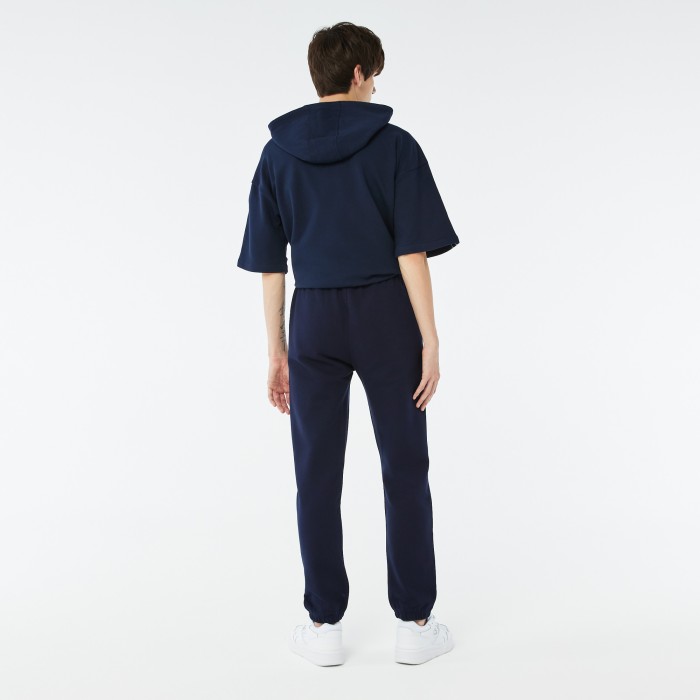 мужские флисовые брюки  для спорта tennis от бренда lacoste вид слева