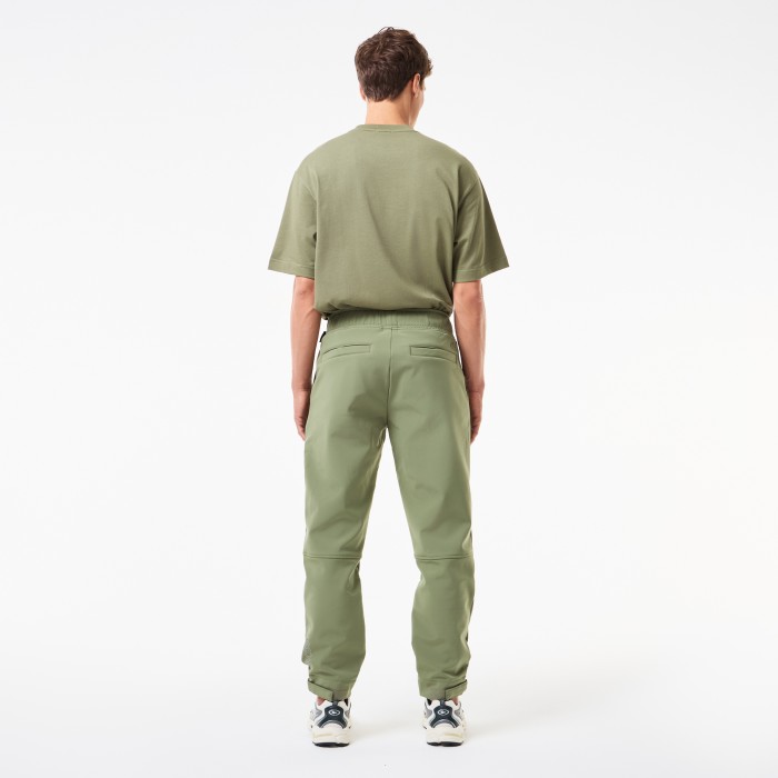 мужские флисовые водоотталкивающие брюки  от бренда lacoste вид слева
