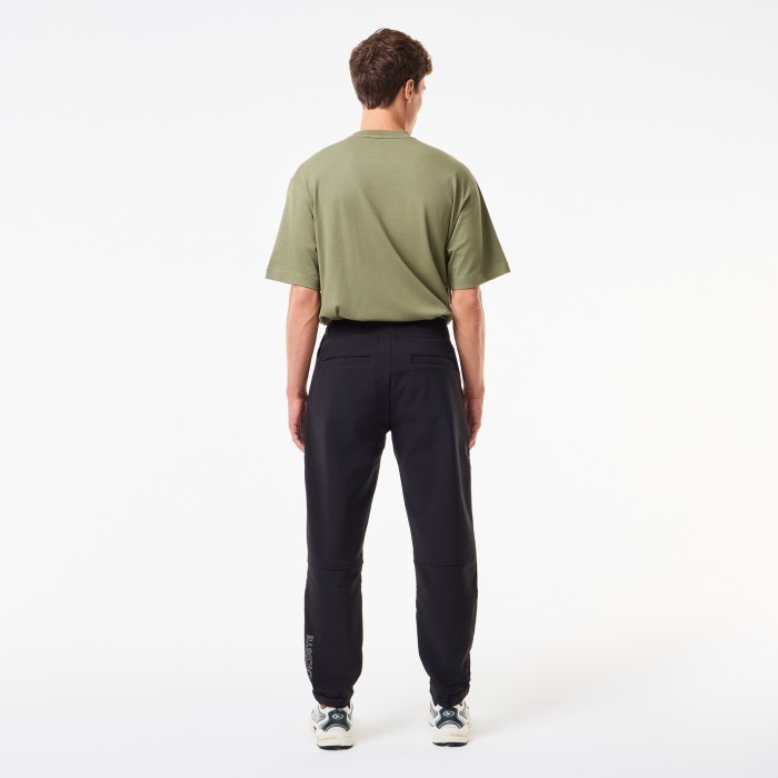 мужские флисовые водоотталкивающие брюки  от бренда lacoste вид слева