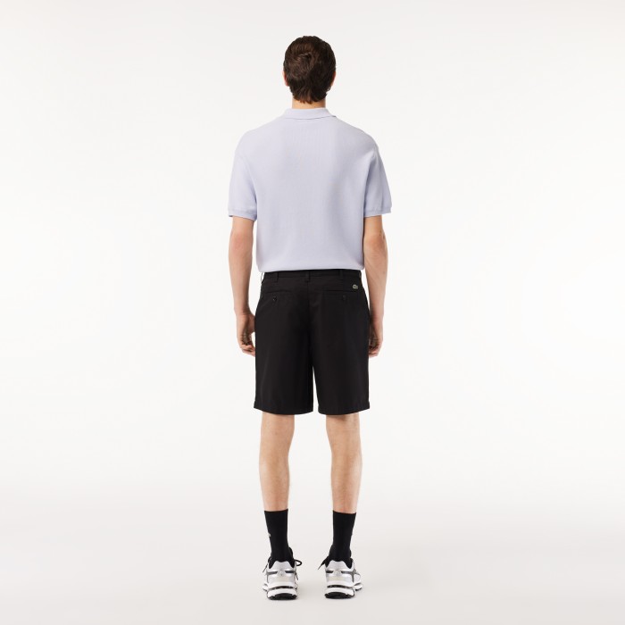 мужские хлопковые шорты  прямого кроя от бренда lacoste вид слева