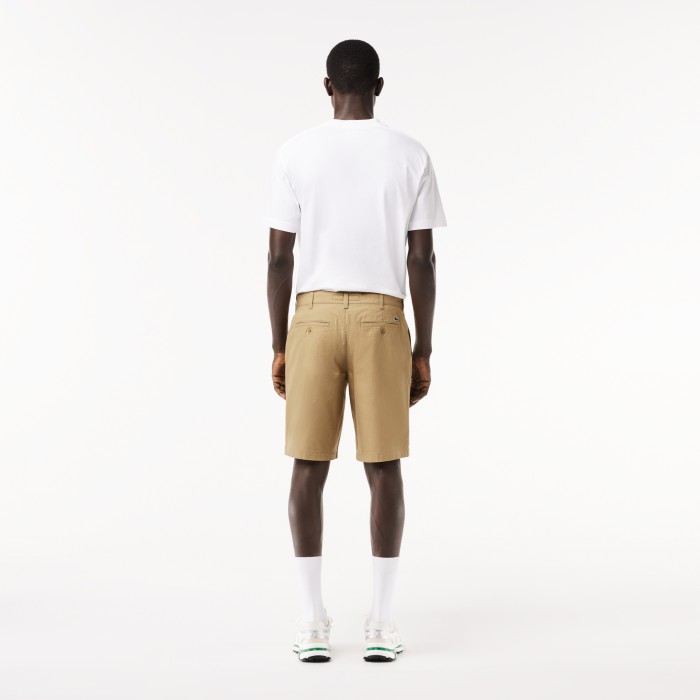 мужские хлопковые шорты  прямого кроя от бренда lacoste вид слева