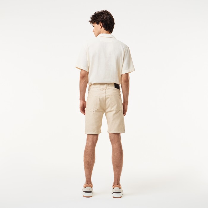 мужские хлопковые шорты  от бренда lacoste вид слева