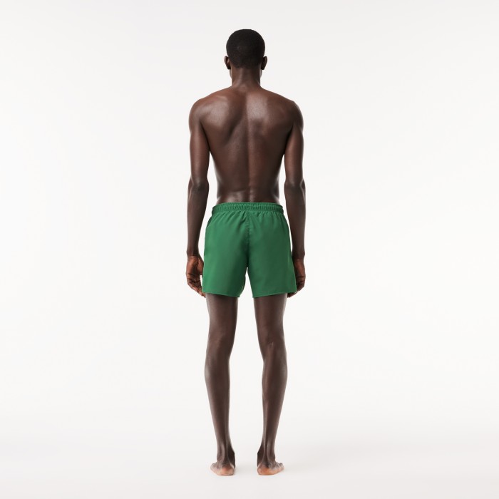 мужские купальные шорты  от бренда lacoste вид слева
