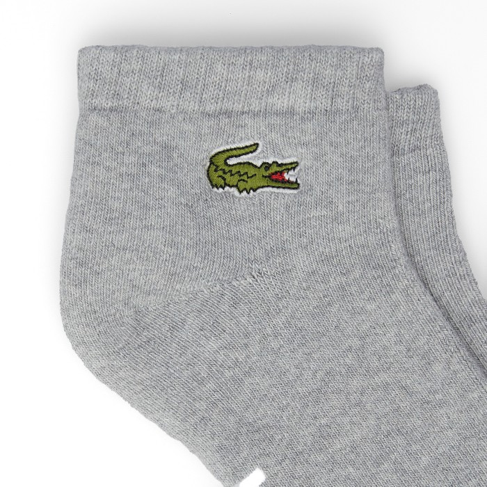 мужские носки  от бренда lacoste вид слева