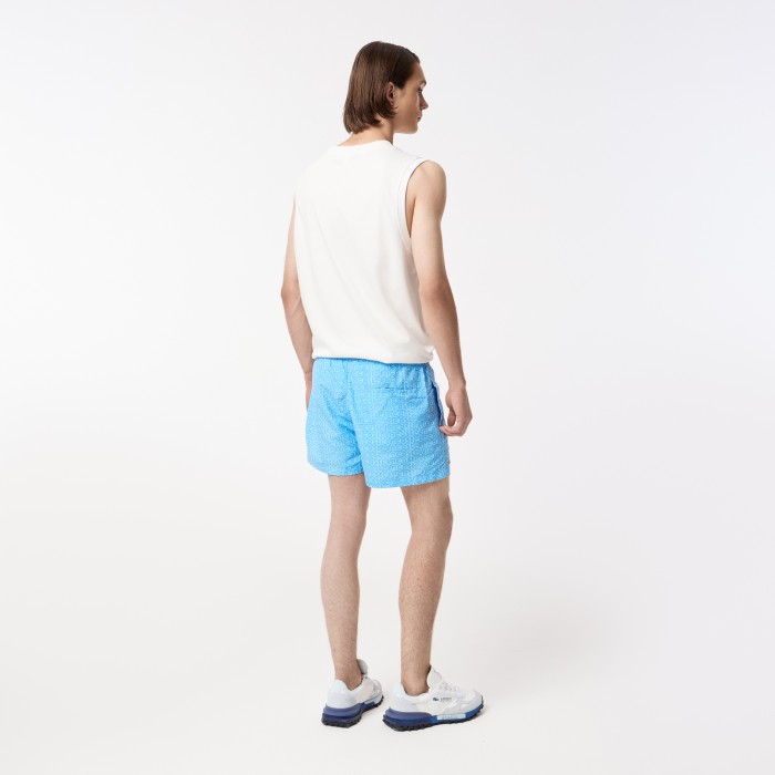 мужские плавательные шорты  от бренда lacoste вид слева
