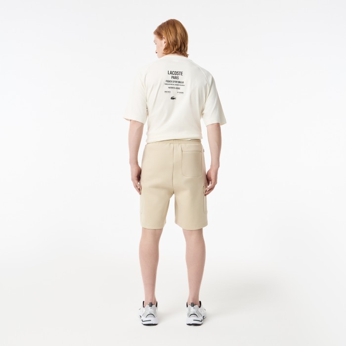 мужские шорты  из эластичного хлопка от бренда lacoste вид слева