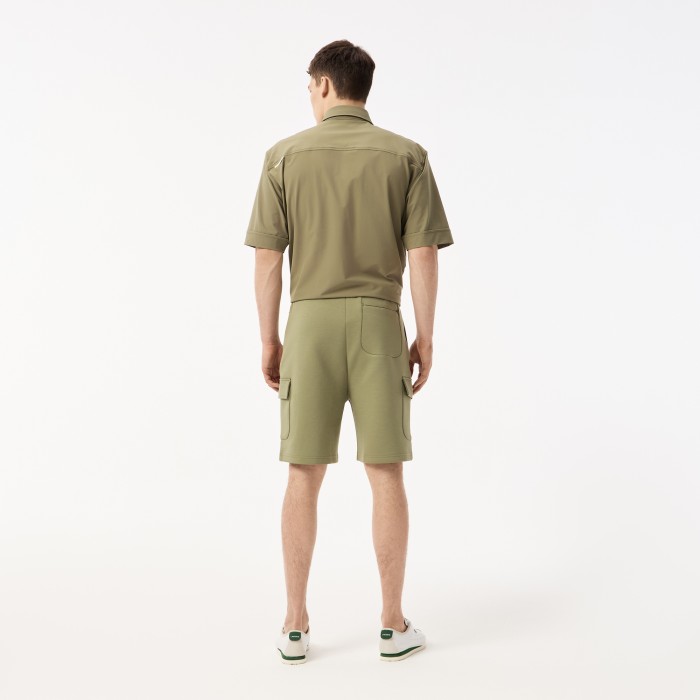 мужские шорты  из эластичного хлопка от бренда lacoste вид слева