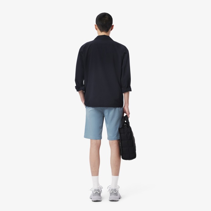 мужские шорты  из эластичного органического хлопка от бренда lacoste вид слева