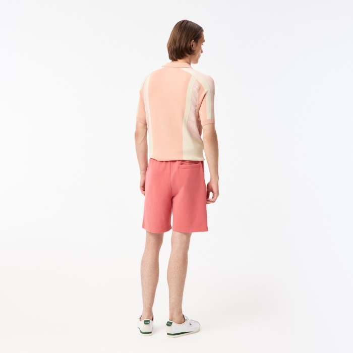 мужские шорты  из органического хлопка от бренда lacoste вид слева
