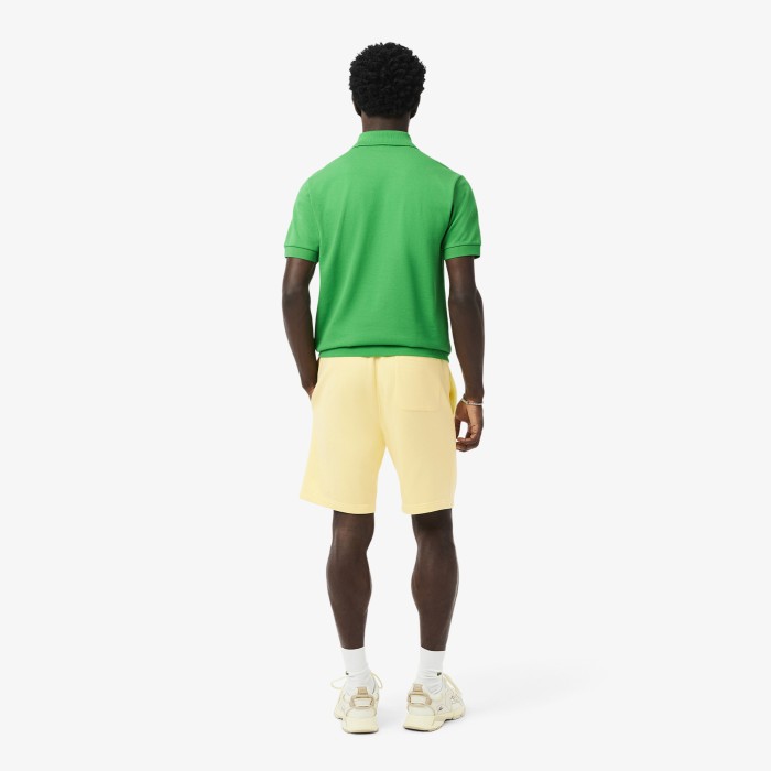 мужские шорты  из органического хлопка от бренда lacoste вид слева