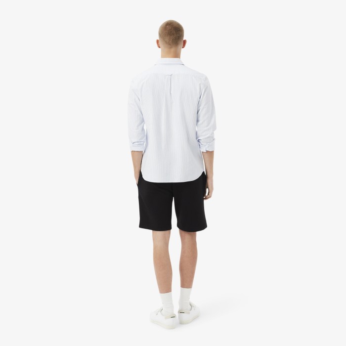 мужские шорты  из органического хлопка от бренда lacoste вид слева