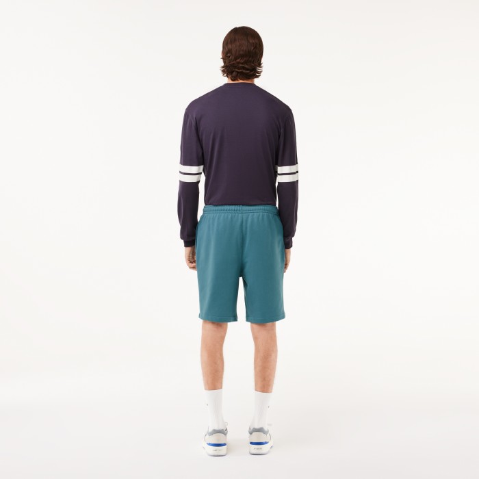 мужские шорты  стандартного кроя от бренда lacoste вид слева