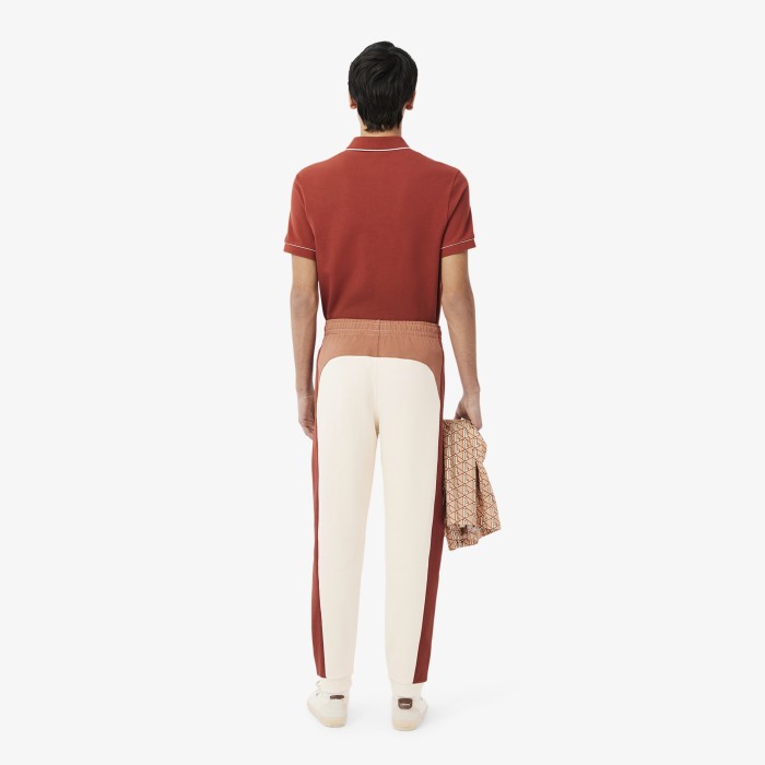 мужские спортивные брюки  из хлопка от бренда lacoste вид слева