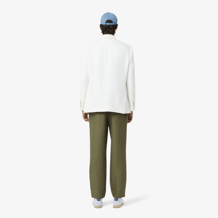 мужские спортивные брюки  из смеси льна и вискозы от бренда lacoste вид слева