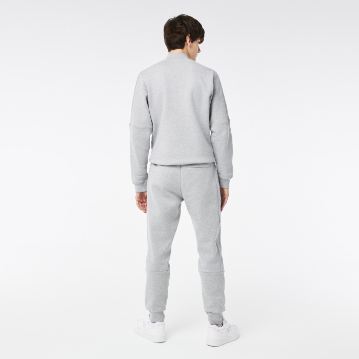 мужские спортивные брюки  приталенного кроя с флисом от бренда lacoste вид слева