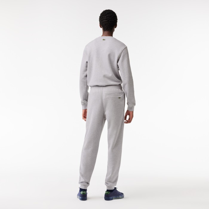 мужские спортивные брюки  с флисом от бренда lacoste вид слева
