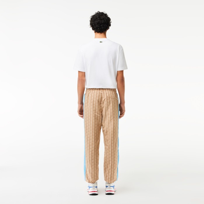 мужские спортивные брюки  от бренда lacoste вид слева