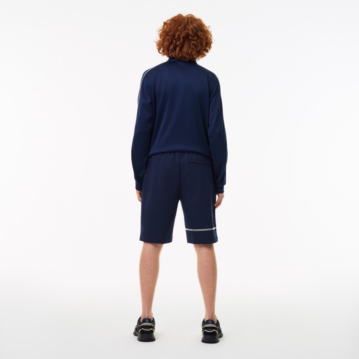 мужские спортивные шорты  стандартного кроя от бренда lacoste вид слева