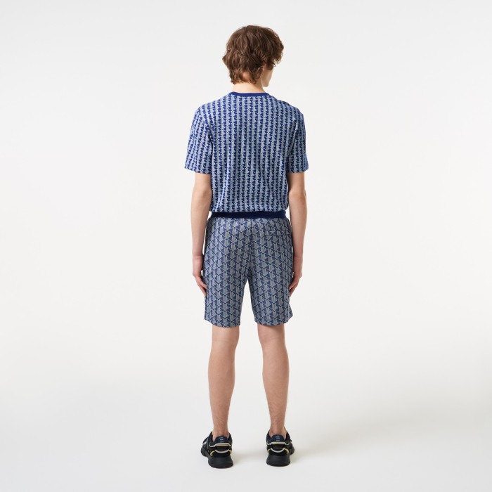 мужские спортивные шорты  от бренда lacoste вид слева