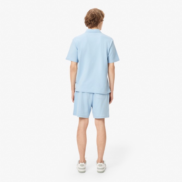 мужские текстурированные шорты  от бренда lacoste вид слева